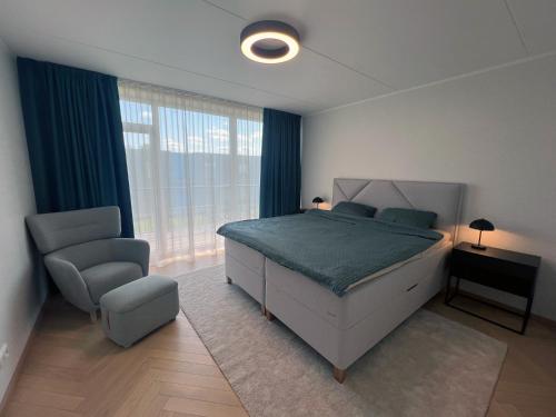 En eller flere senge i et værelse på A stylish & cozy terraced house in Tartu
