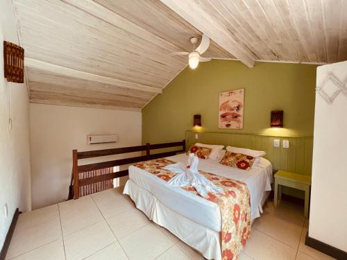 Cama o camas de una habitación en Pousada Tatuapara