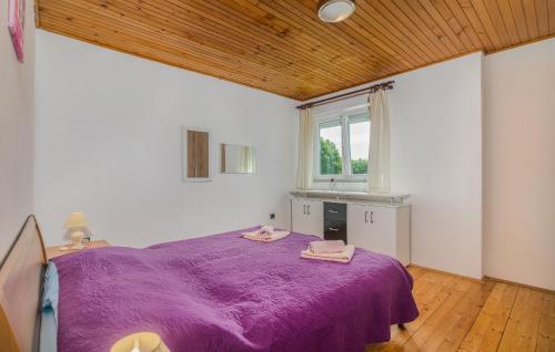 Postel nebo postele na pokoji v ubytování Apartmani M