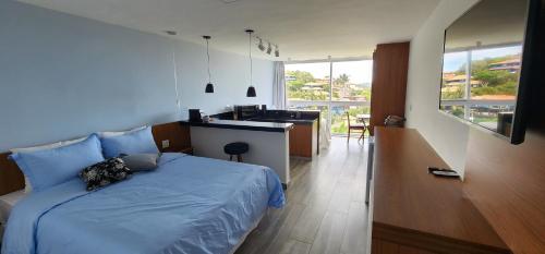 Cama o camas de una habitación en Pousada Santorini