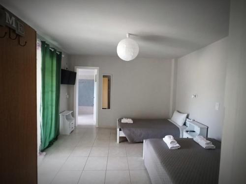 Postel nebo postele na pokoji v ubytování Demis Apartments