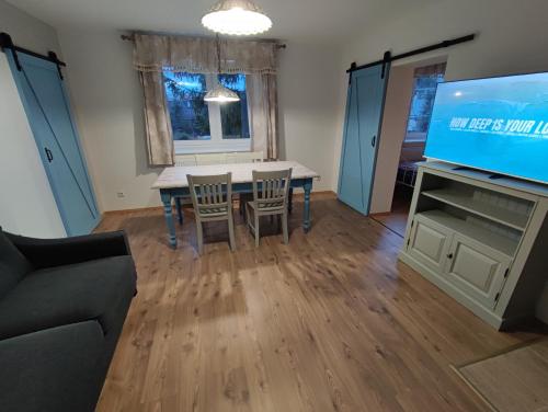 Ein Sitzbereich in der Unterkunft Apartman Šumiac 4