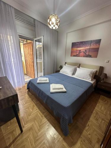 Ένα ή περισσότερα κρεβάτια σε δωμάτιο στο Agnanti Apartment