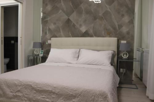 Ένα ή περισσότερα κρεβάτια σε δωμάτιο στο SUITE 54