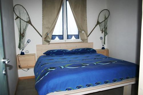 Posteľ alebo postele v izbe v ubytovaní Oca Giuliva
