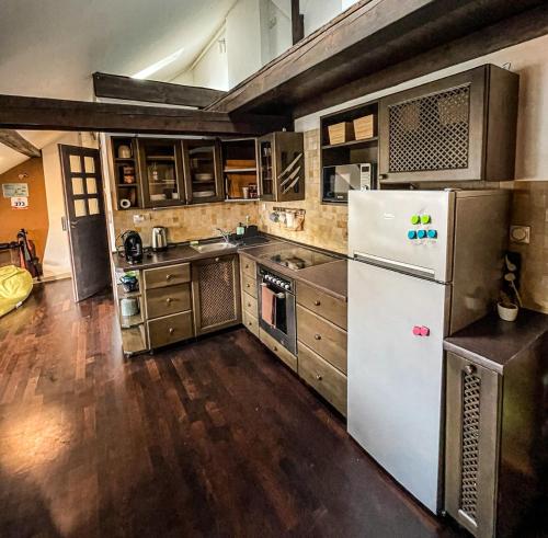 Kuchyňa alebo kuchynka v ubytovaní Reload Apartment
