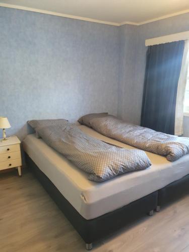 Postel nebo postele na pokoji v ubytování Apartment Kongsgård