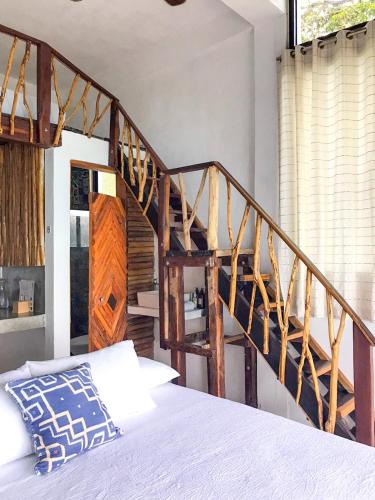 Katil atau katil-katil dalam bilik di Xcabal Hotel boutique