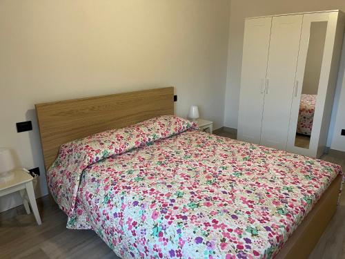 Letto o letti in una camera di IL GINEPRO