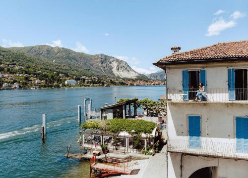 a view of a body of water with a house at Historical Penthouse on Isola dei Pescatori in Someraro