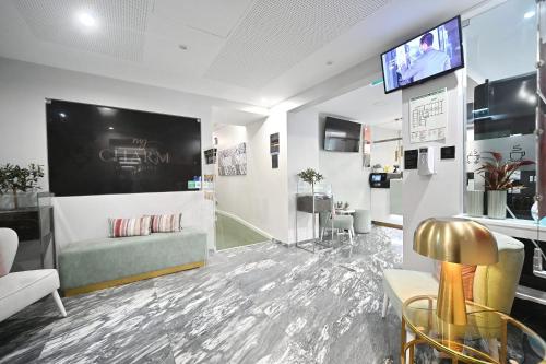 TV a/nebo společenská místnost v ubytování My Charm Lisbon Suites