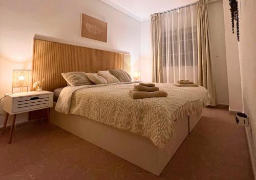 Ένα ή περισσότερα κρεβάτια σε δωμάτιο στο Apartament Blanca