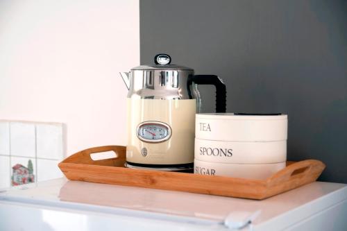 a blender sitting on a cutting board on a counter at Villa B&B Marina & Parking Free in Rovinj