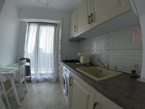 Køkken eller tekøkken på BelleMario by Solid House