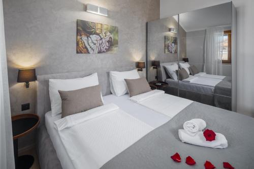 Ένα ή περισσότερα κρεβάτια σε δωμάτιο στο Villa Alena