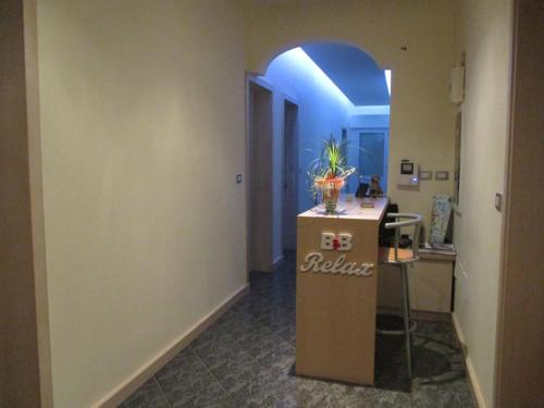 a hallway with a counter in a room at B&B Relax in Porto Cesareo