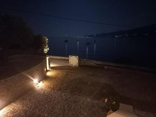 a view of a body of water at night at Sunny Kotronas in Kótronas