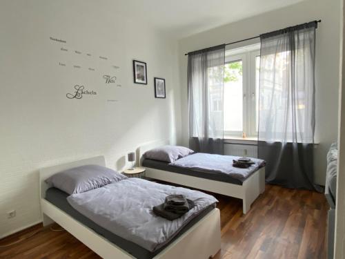 Katil atau katil-katil dalam bilik di Ruhrpott Apartment Zentral