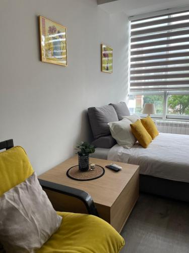 Postel nebo postele na pokoji v ubytování Kamche apartment