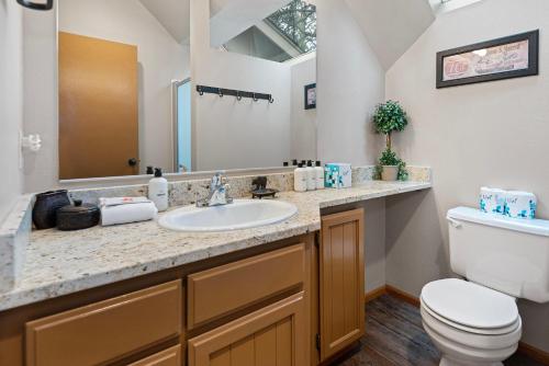 a bathroom with a sink and a toilet at 18 Deer Lane in Sunriver