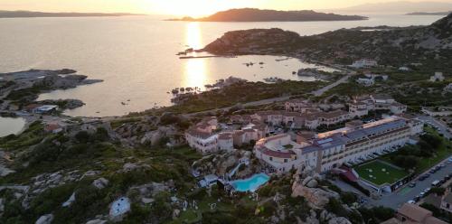 an aerial view of a resort on the shore of a body of water at Suite con giardino in La Maddalena