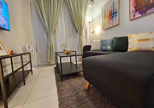 Giường trong phòng chung tại Fabulous View Circulo Verde, Manila QC
