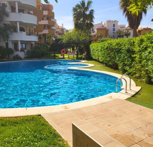 Bazén v ubytování Apartamento Sultan, Punta Prima, Panorama Park, 2 bed & 2 beautiful swimming pools nebo v jeho okolí