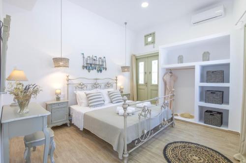Postel nebo postele na pokoji v ubytování Arethousa House