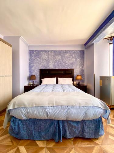 Cama o camas de una habitación en Las Tholas Hotel