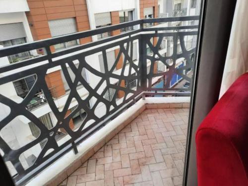 a balcony with a view of a building at appartement TAza in Casablanca