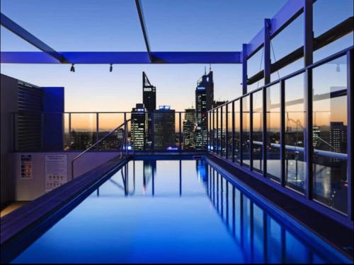 a view of a city skyline from a building with a pool at In the city Perth 1B1B Pool and nice view in Perth
