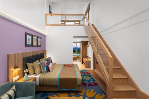 a bedroom with a bed and a staircase at Bookmark Resorts, Manali in Manāli