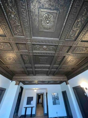 a room with a ceiling with a painting on it at 1 Bedroom Apartment Downtown in Detroit