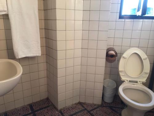 Koupelna v ubytování Huang Kai Hotel