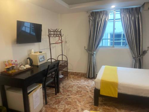 Best Central Point Hotelにあるベッド