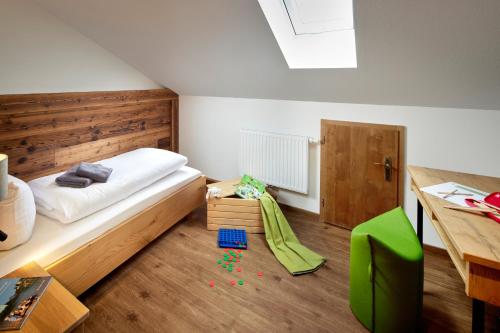 Un ou plusieurs lits dans un hébergement de l'établissement Maximilian Appartements