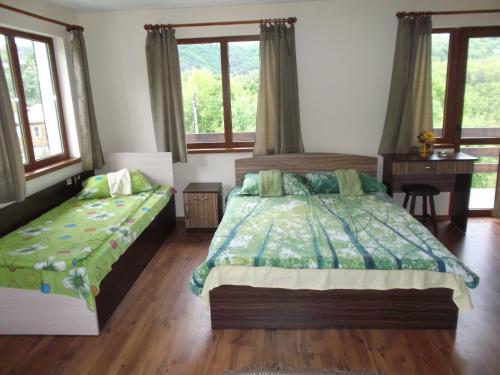 Легло или легла в стая в Къща за Гости Балкански Кът