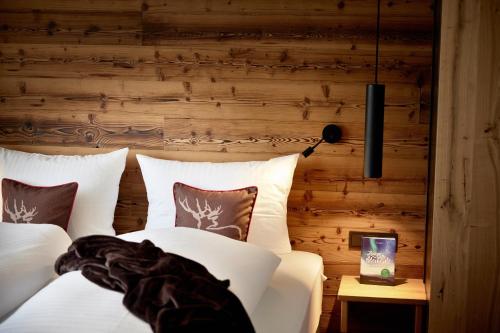 Un ou plusieurs lits dans un hébergement de l'établissement Maximilian Appartements