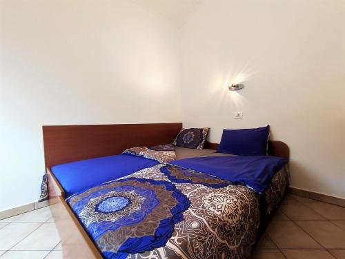 Posteľ alebo postele v izbe v ubytovaní Lavanda apartment