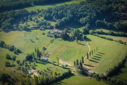 an aerial view of a large field with trees at Ferme de Lacassagne in Vazerac