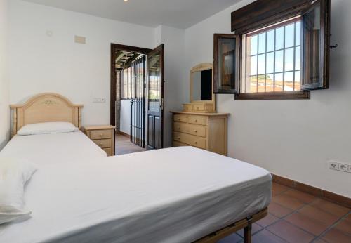 Postel nebo postele na pokoji v ubytování Casa Jimena 8 personas