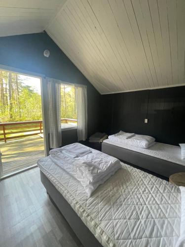 Postel nebo postele na pokoji v ubytování Raet Camping