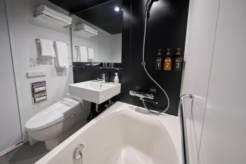 Ένα μπάνιο στο Hotel Resol Trinity Osaka