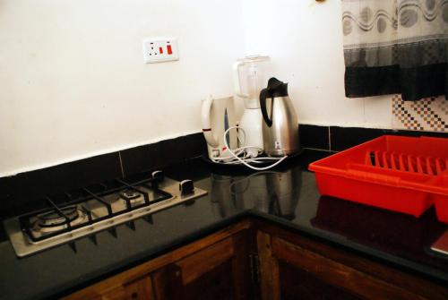 Dapur atau dapur kecil di Pendo Villas Diani Beach