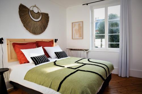 Katil atau katil-katil dalam bilik di Villa L'Anse - 1er étage