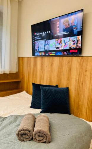 Postel nebo postele na pokoji v ubytování BL LAKESIDE APARTMAN