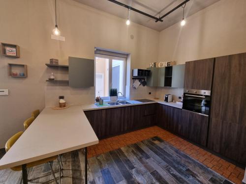 Kuchyň nebo kuchyňský kout v ubytování Villa Pintucci