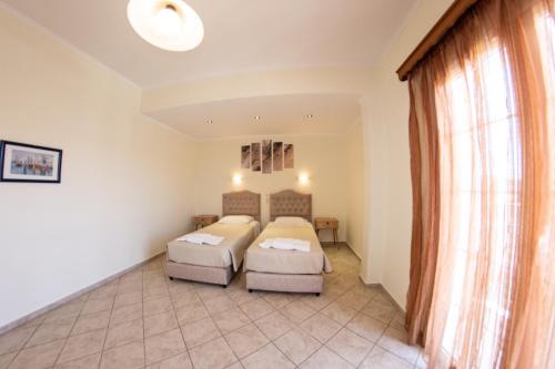 Imagen de la galería de Kapetanios Apartments, en Agios Stefanos