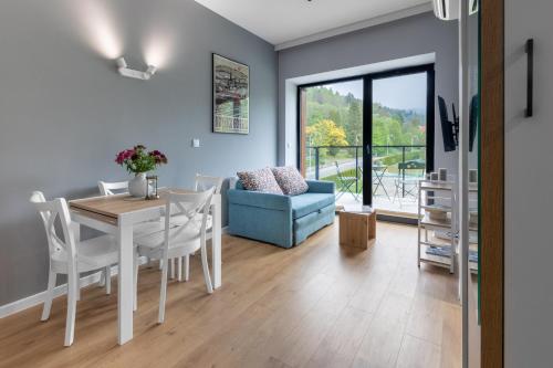 Posedenie v ubytovaní Apartamenty KAPRYS - Centrum