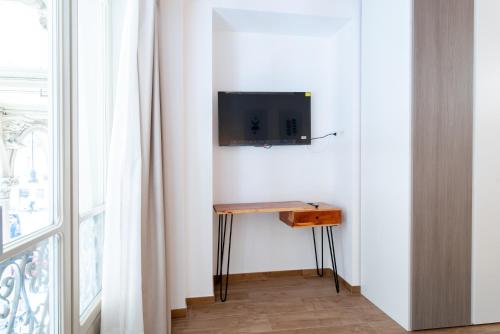Телевизор и/или развлекательный центр в Royal Apartment